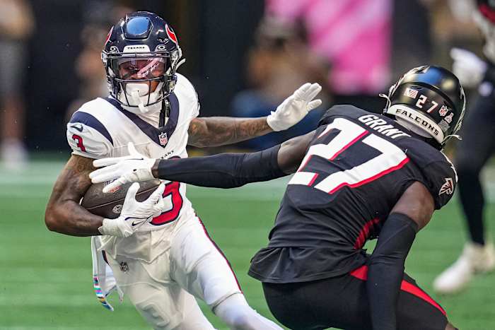 Oct 8, 2023; Atlanta, Georgia, USA; Houston Texans wide receiver Tank Dell (3) runs against Atlanta Falcons safety Richie Grant (27) during the first half at Mercedes-Benz Stadium. Mandatory Credit: Dale Zanine-USA TODAY Sports